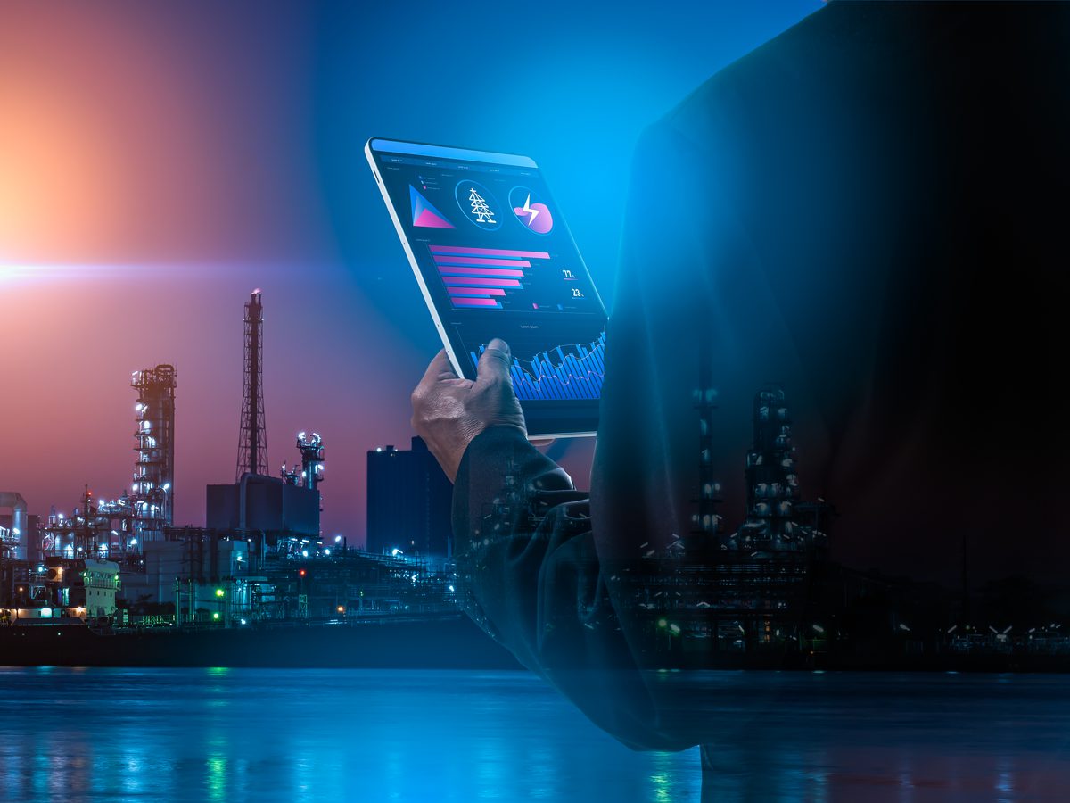 Engineer using the NYX APP on a tablet at an industrial site